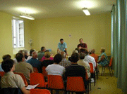 A meeting in a community hall